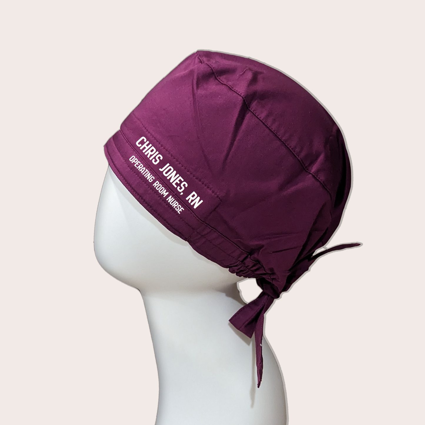 Example of wine colored scrub cap with font 1 only